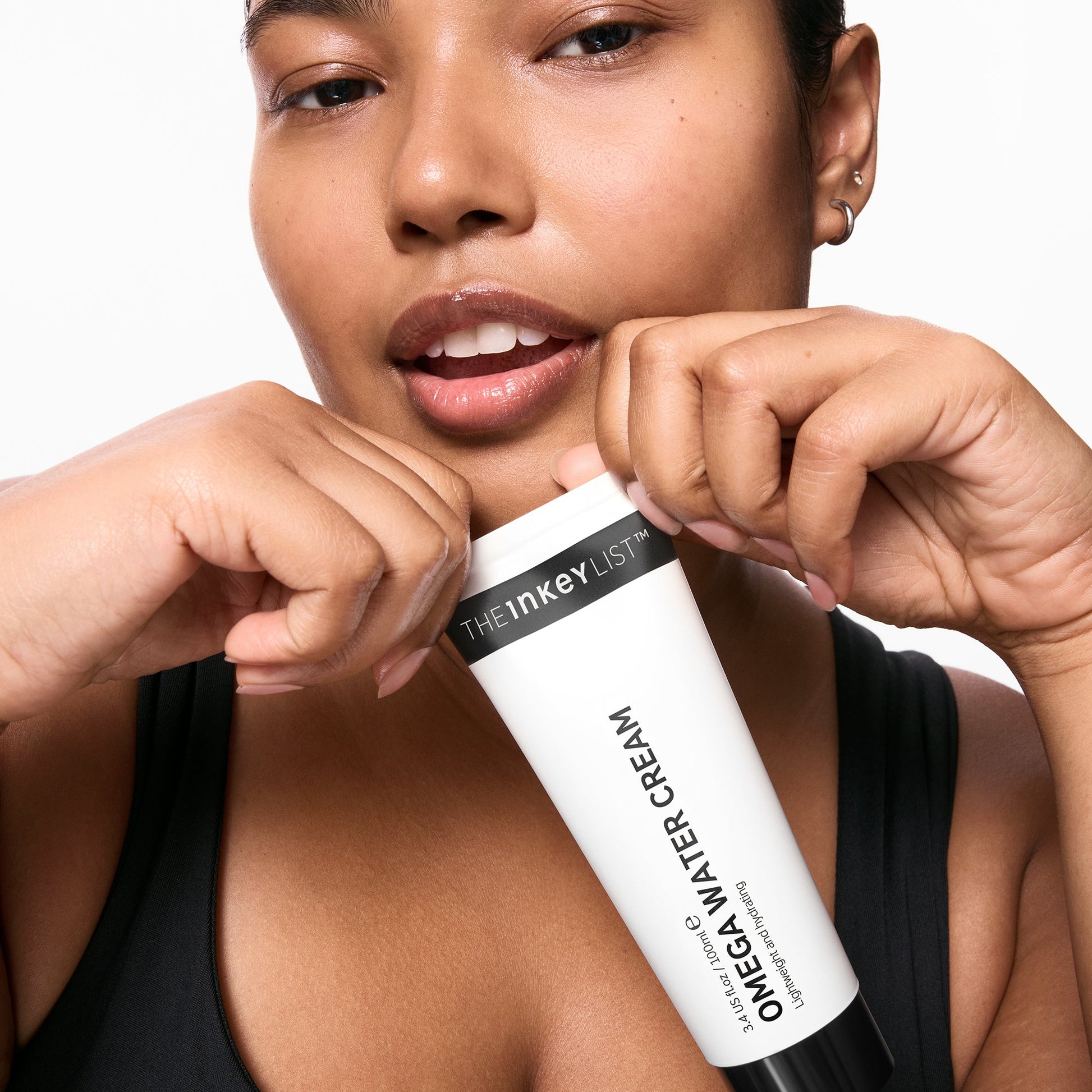 supersize-omega-water-cream-duo-p5 03_KAFFYA_07_HOLDING_OMEGA_SUPERSIZE_001.jpg